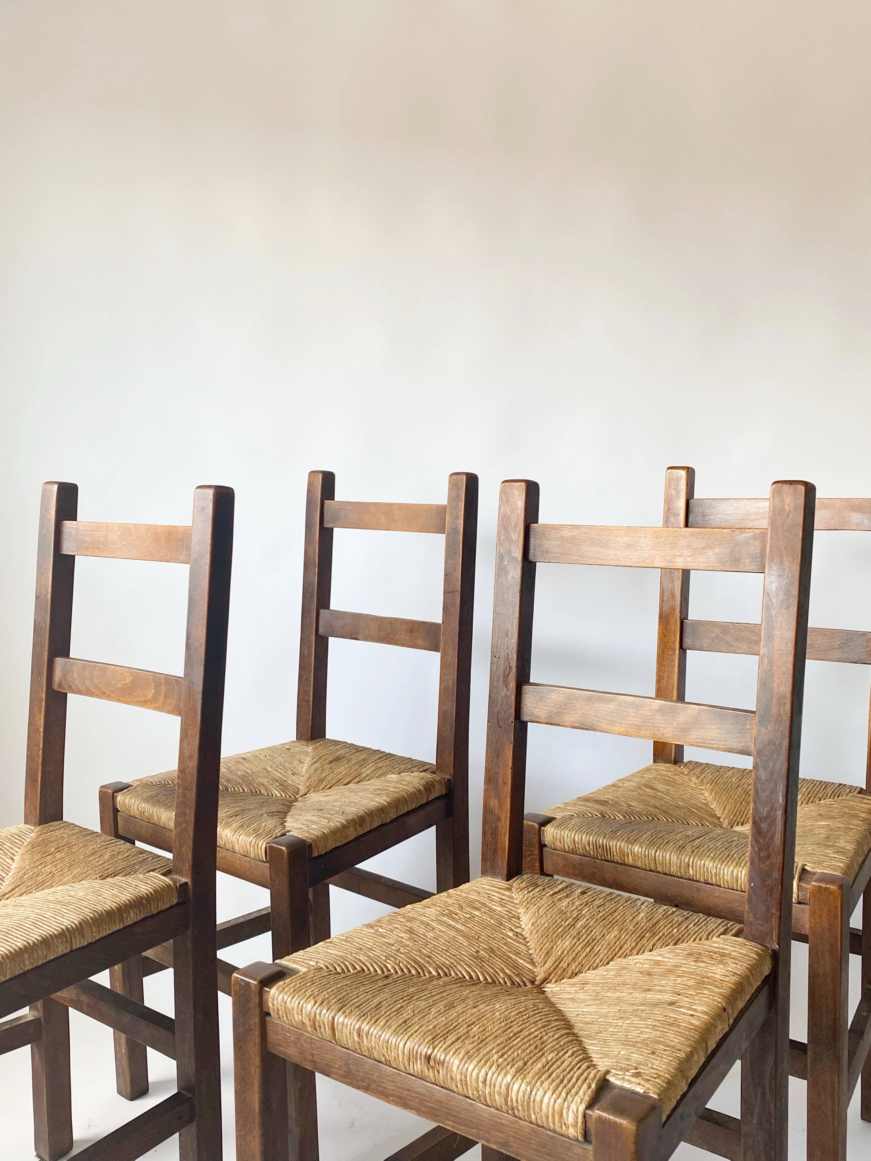 4 wooden and straw country chairs