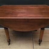 Round table with folding shutters on casters in solid wood year 1973