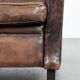 Sleekly shaped timeless design armchair made of sheepskin leather