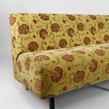 Bench with yellow and red floral fabric, France, circa 1960