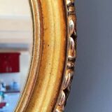 Round golden mirror