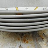 Six hollow plates made of earthenware