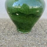 Antique glazed green terracotta oil jar, late 19th century.