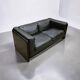 Two-seater sofa in black leather, designed by Tito Agnoli for Poltrona Frau, Italy, 1980s