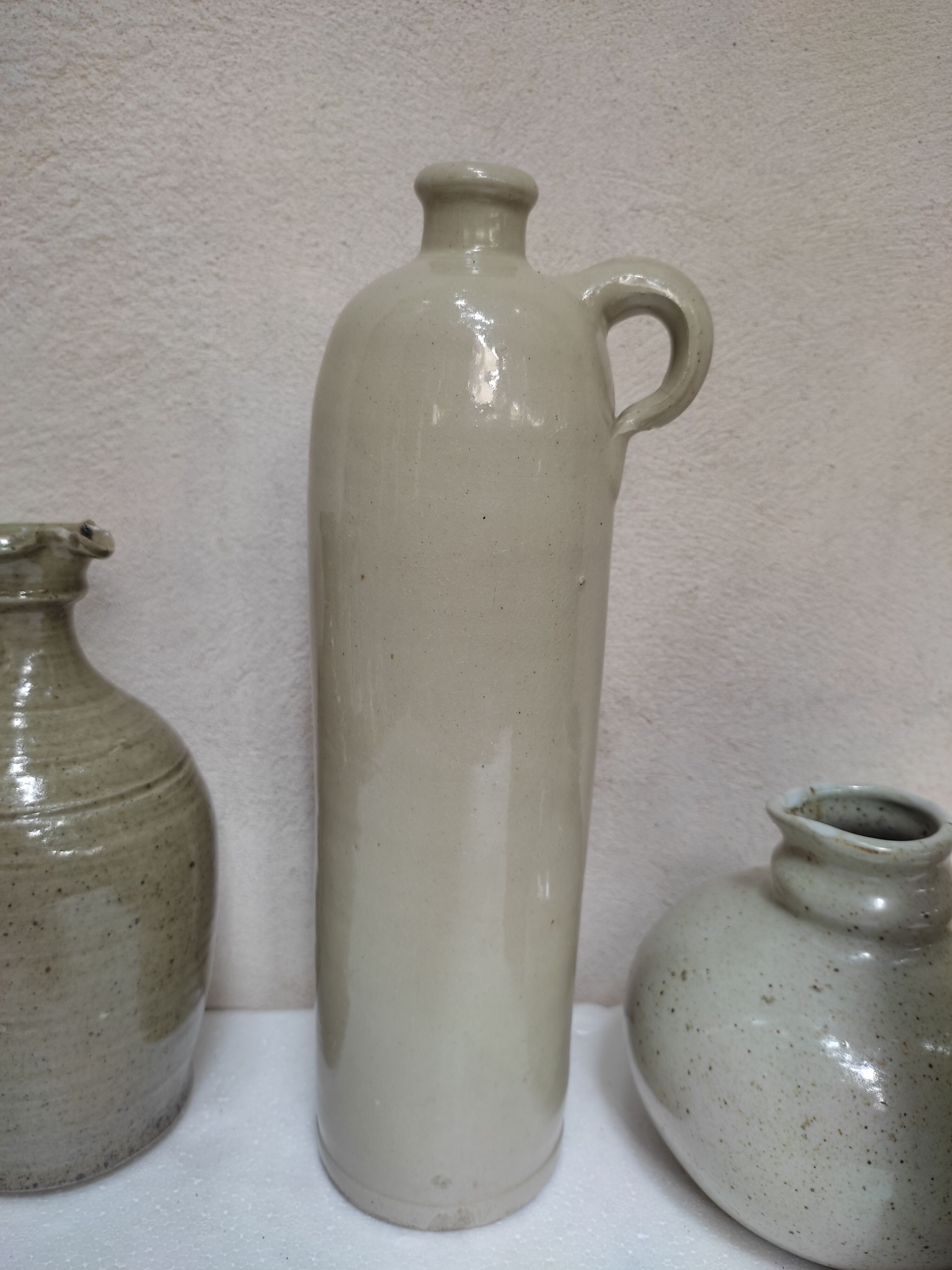 Set of sandstone bottles and pitchers