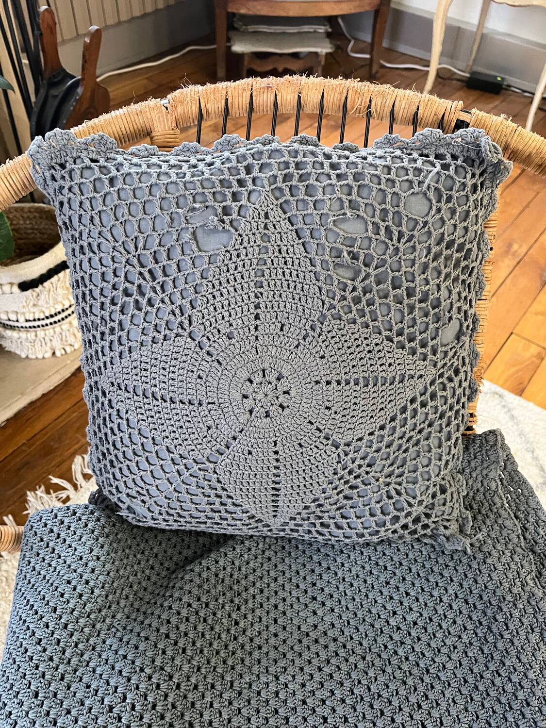 Blue crocheted bedspread and its vintage cushion