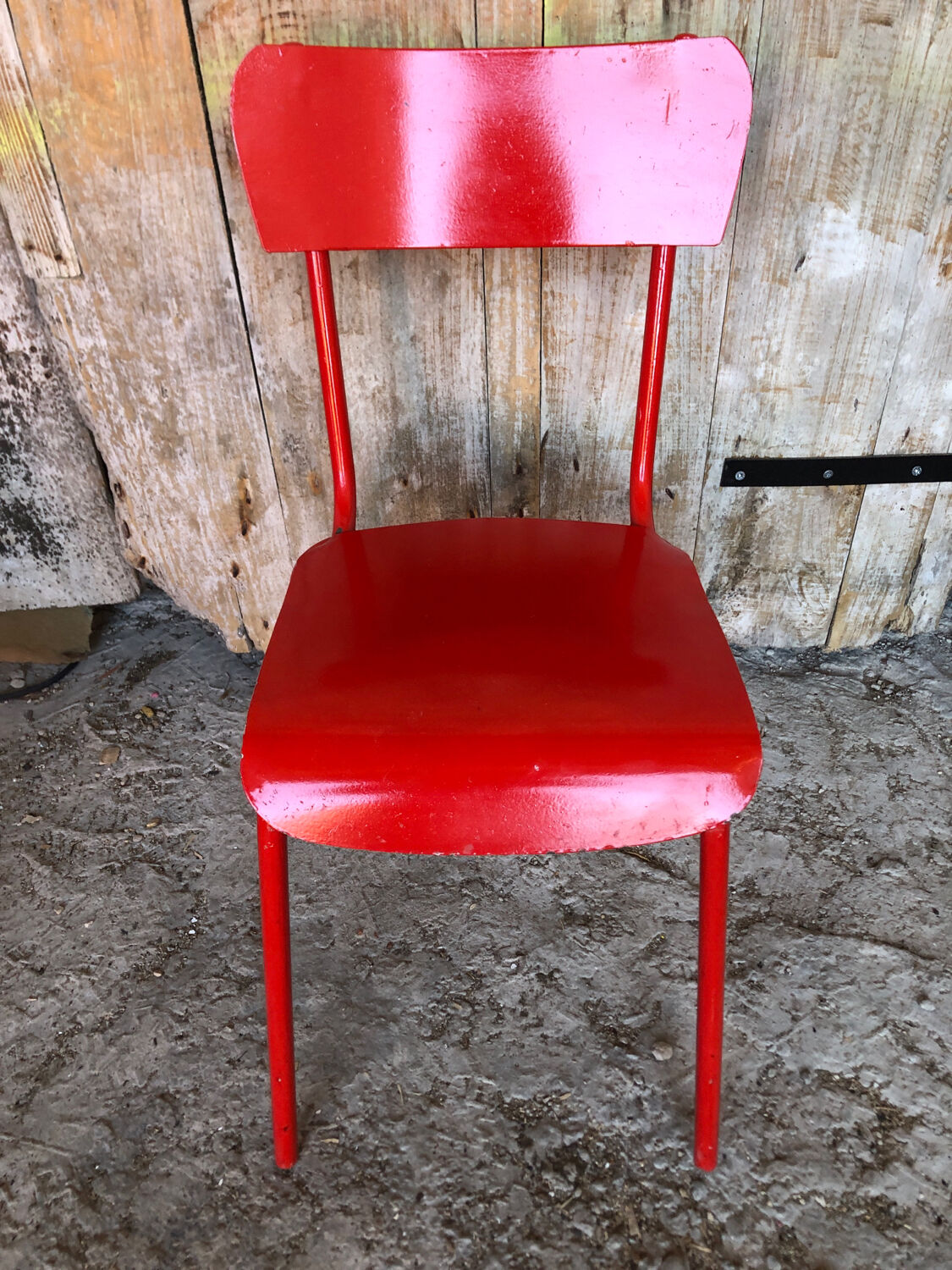 Set of 4 red metal chairs