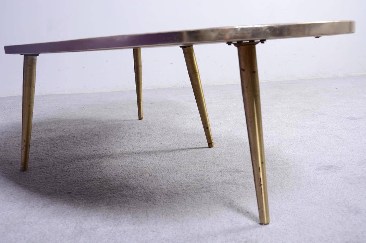 Free-form coffee table dating from the 60s,