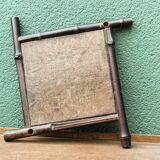 Asymmetrical beveled mirror, bamboo frame