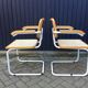 Marcel Breuer's white S64 armchairs