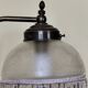 Retro brass lamp with a glass shade and bead fringes.