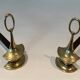 Pair of Bronze Chenets in Neoclassical Style in the Form of an Oil Lamp