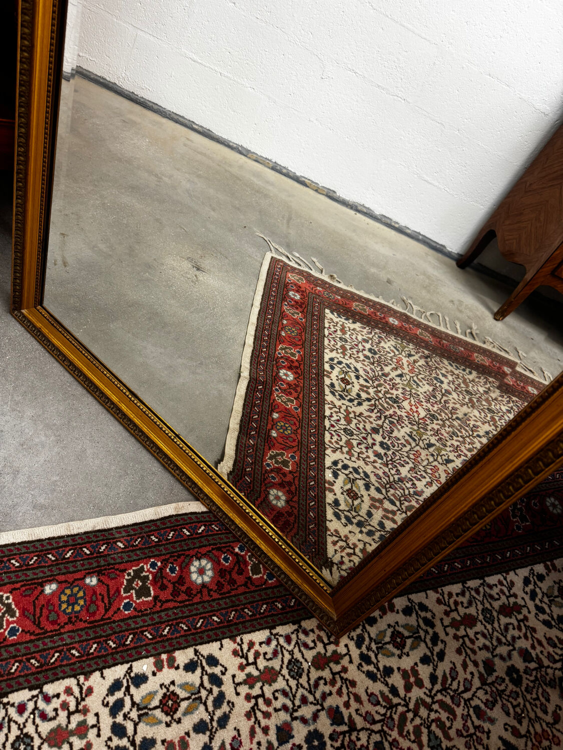 Large gold mirror in the Louis XVI style