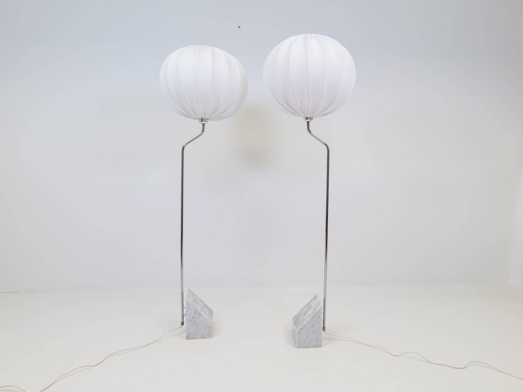 Pair of Bergboms marble and steel floor lamps from the mid-century, 1970s, Sweden.