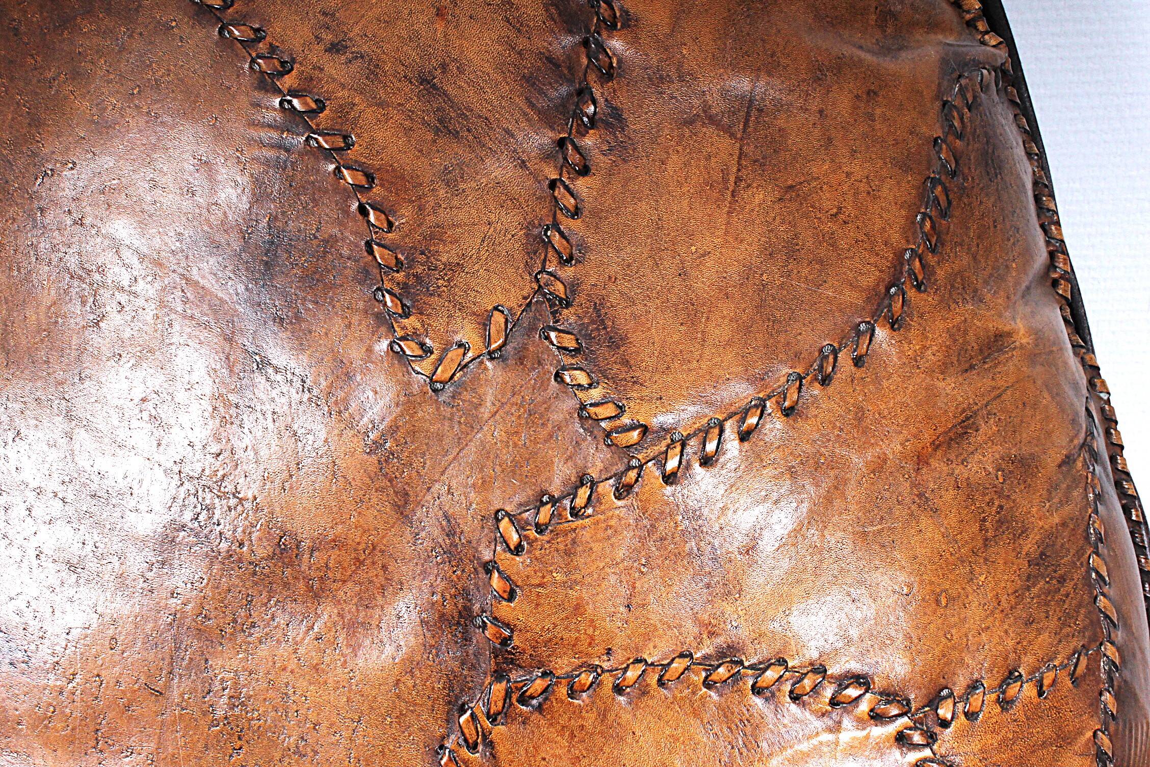 Brutalist oak lounge chair and ottoman, 1970s, set of 2