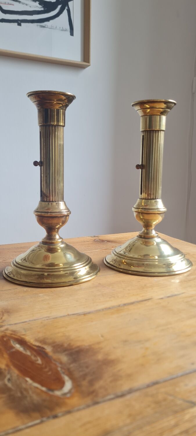 Pair of brass candle holders