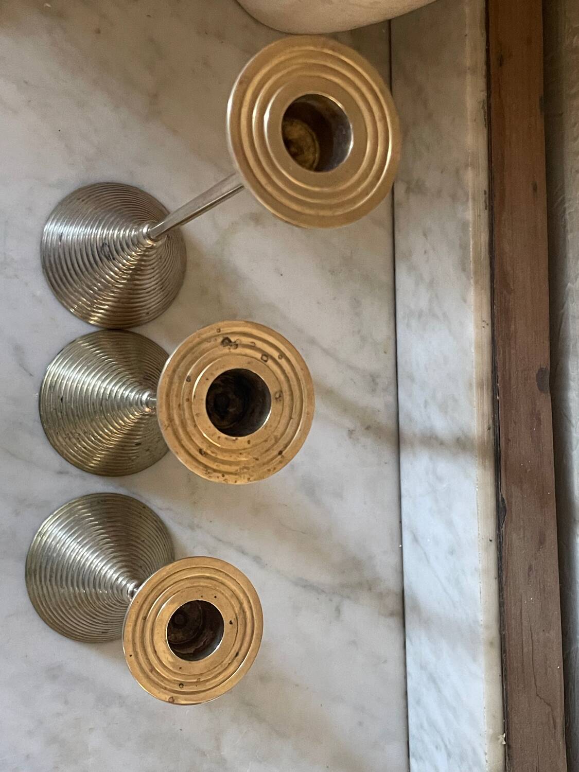 Set of three vintage brass candle holders