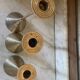 Set of three vintage brass candle holders