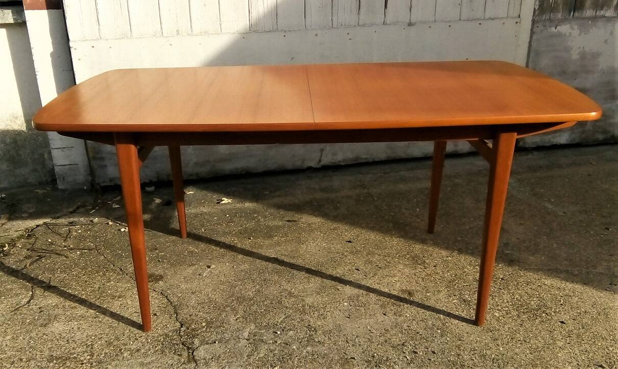 Danish Scandinavian teak dining table with extensions