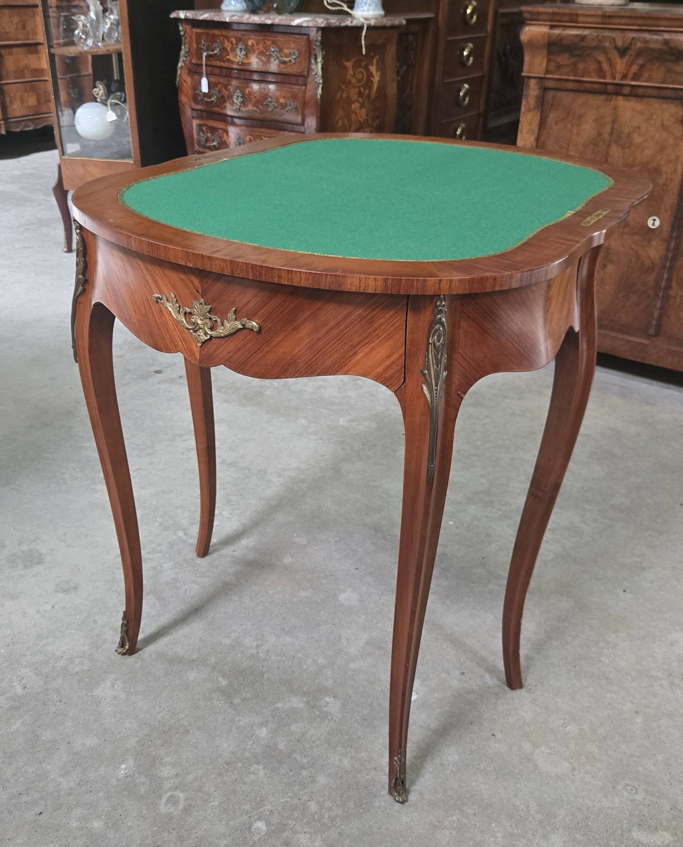 Half-moon gaming table in Louis XV style, made of precious wood marquetry.