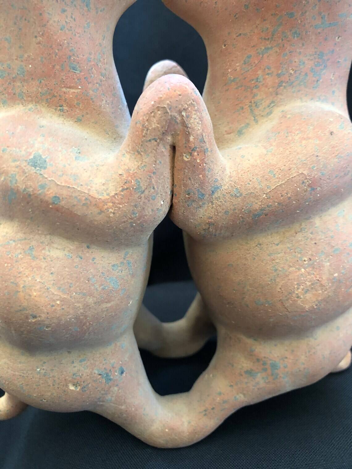 Pre-columbian style terracotta sculpture dancing fat dogs from colima mexico culture