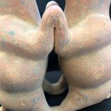 Pre-columbian style terracotta sculpture dancing fat dogs from colima mexico culture