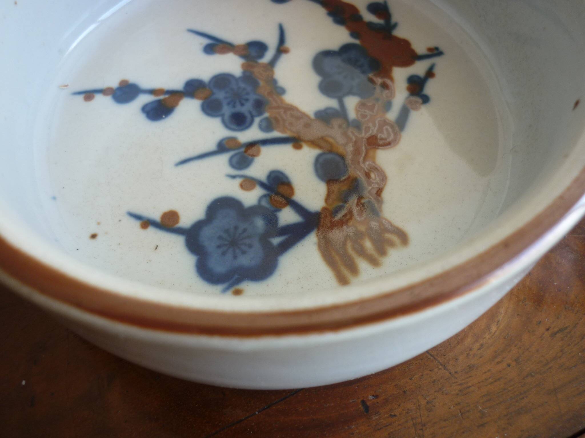 3 ceramic casserole dishes with blue and brown branch pattern