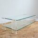 Vintage 1970s double-tier glass and plexiglass coffee table.