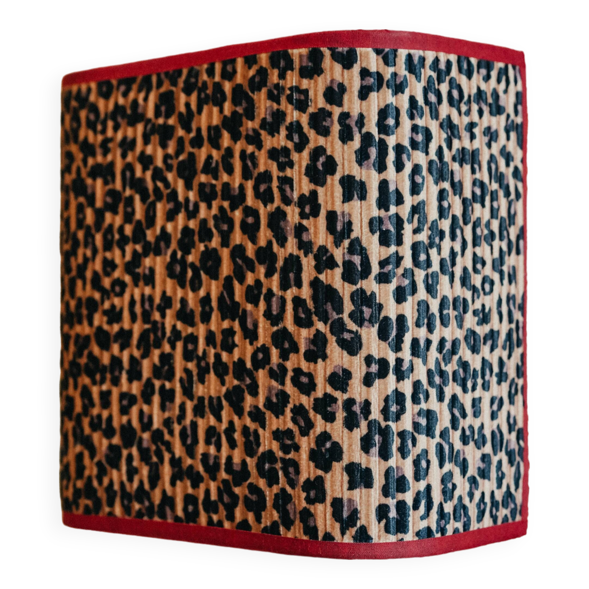 La divine – pleated leopard applique.