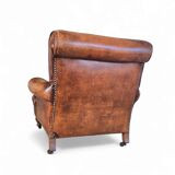 fauteuil club en cuir de mouton anglais ancien avec accoudoirs