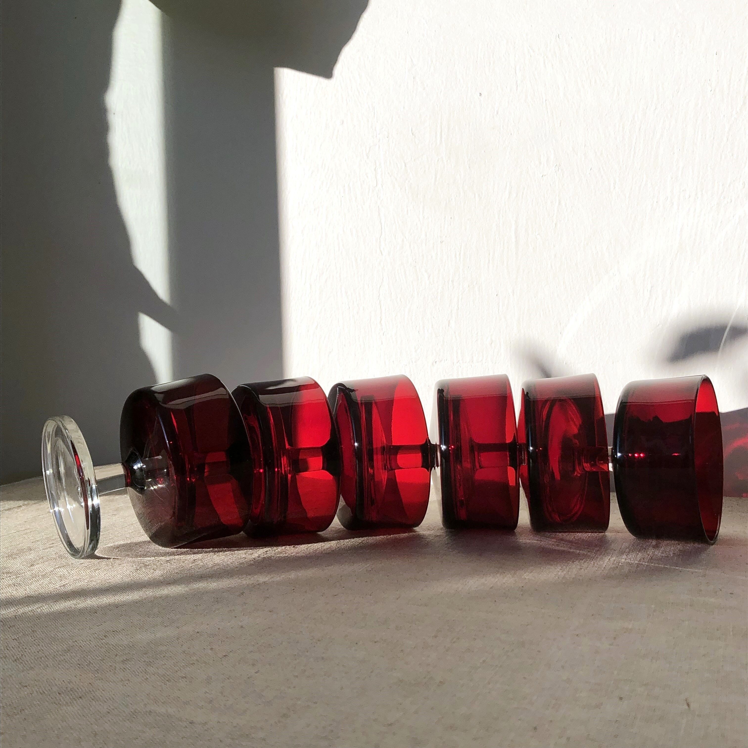 Translucent red champagne or dessert glasses, model Cavalier Luminarc 70s'.