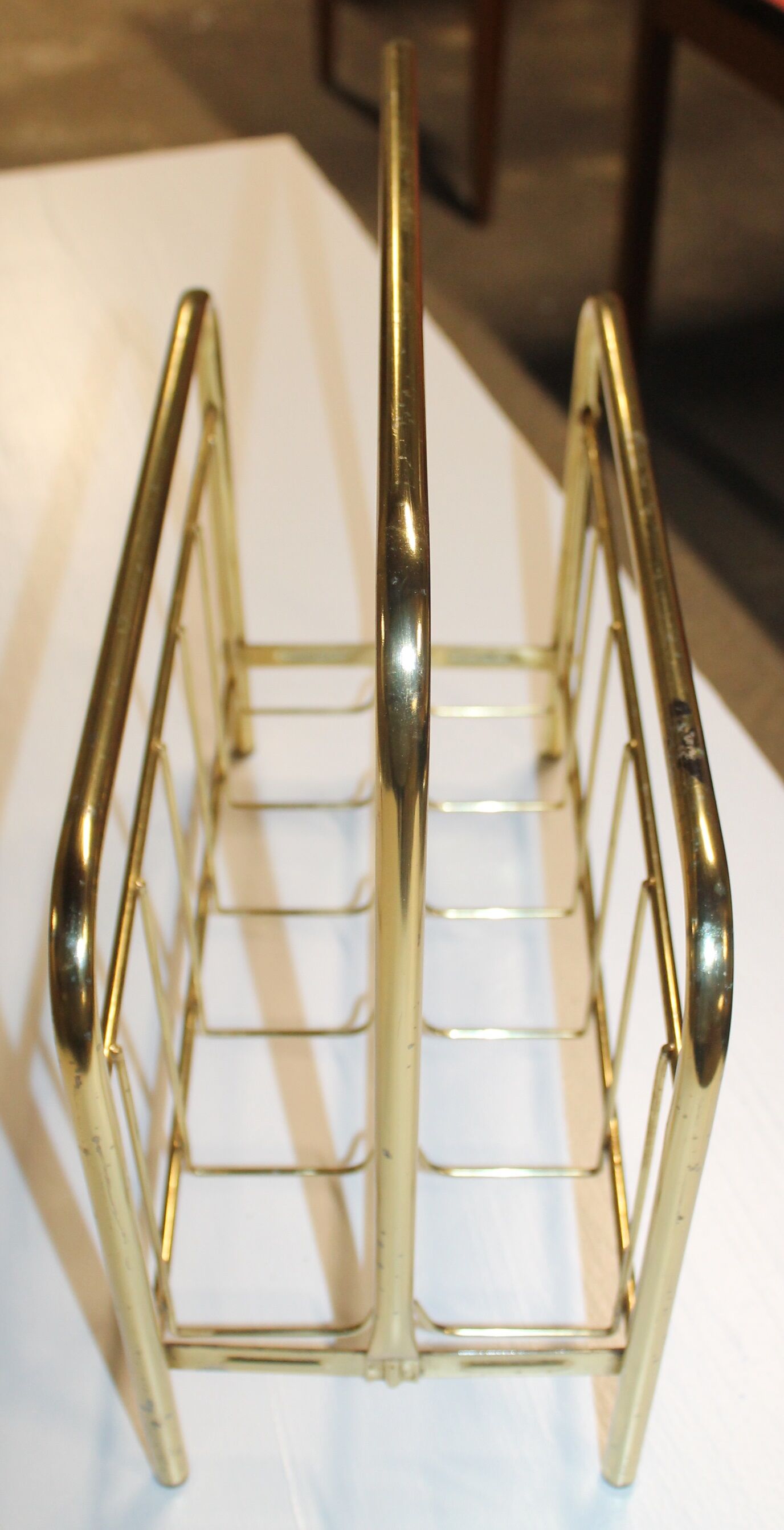 Golden magazine rack