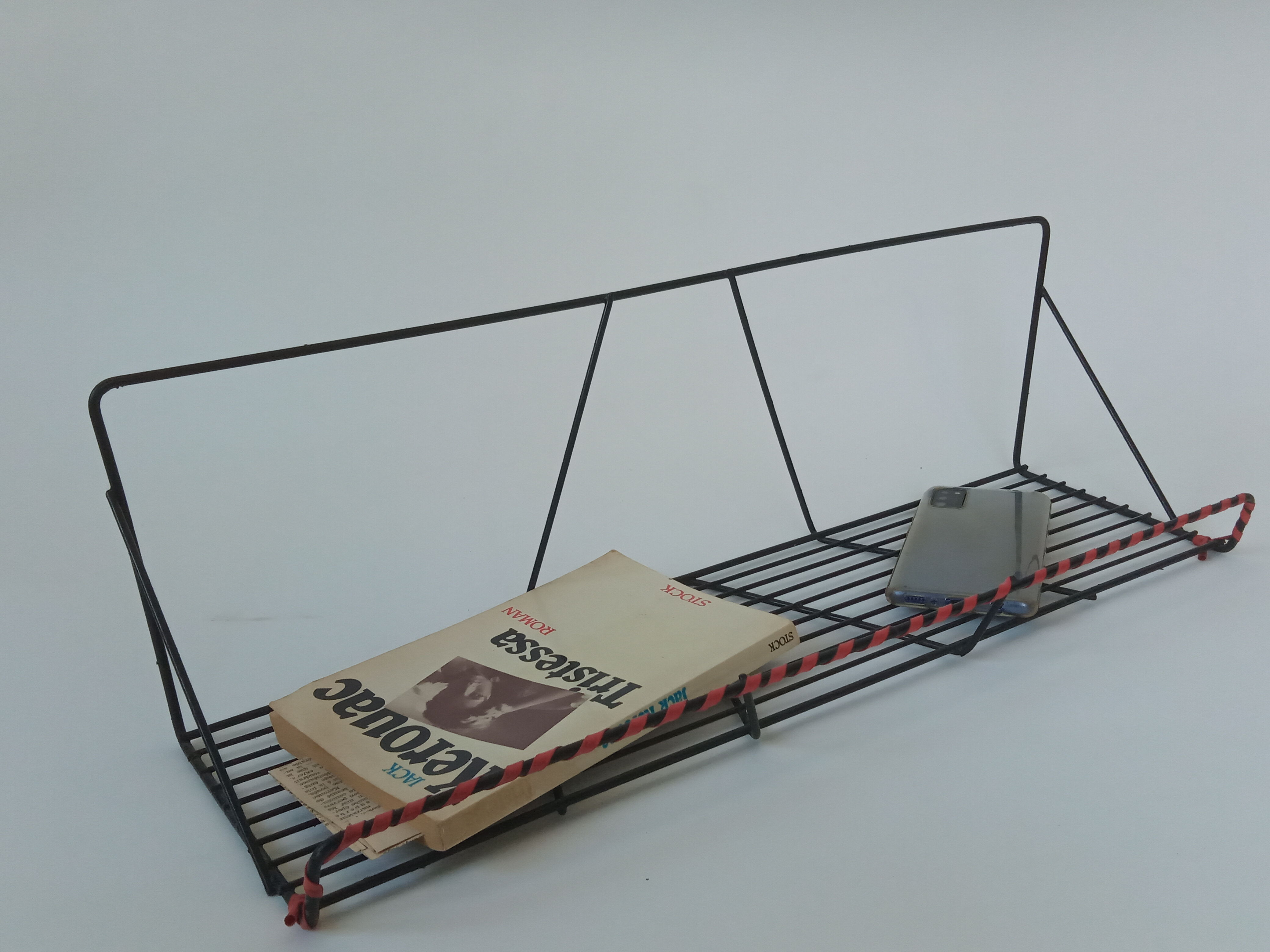 Vintage wall shelf made of metal wire