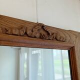 Antique mirror with knot in light oak