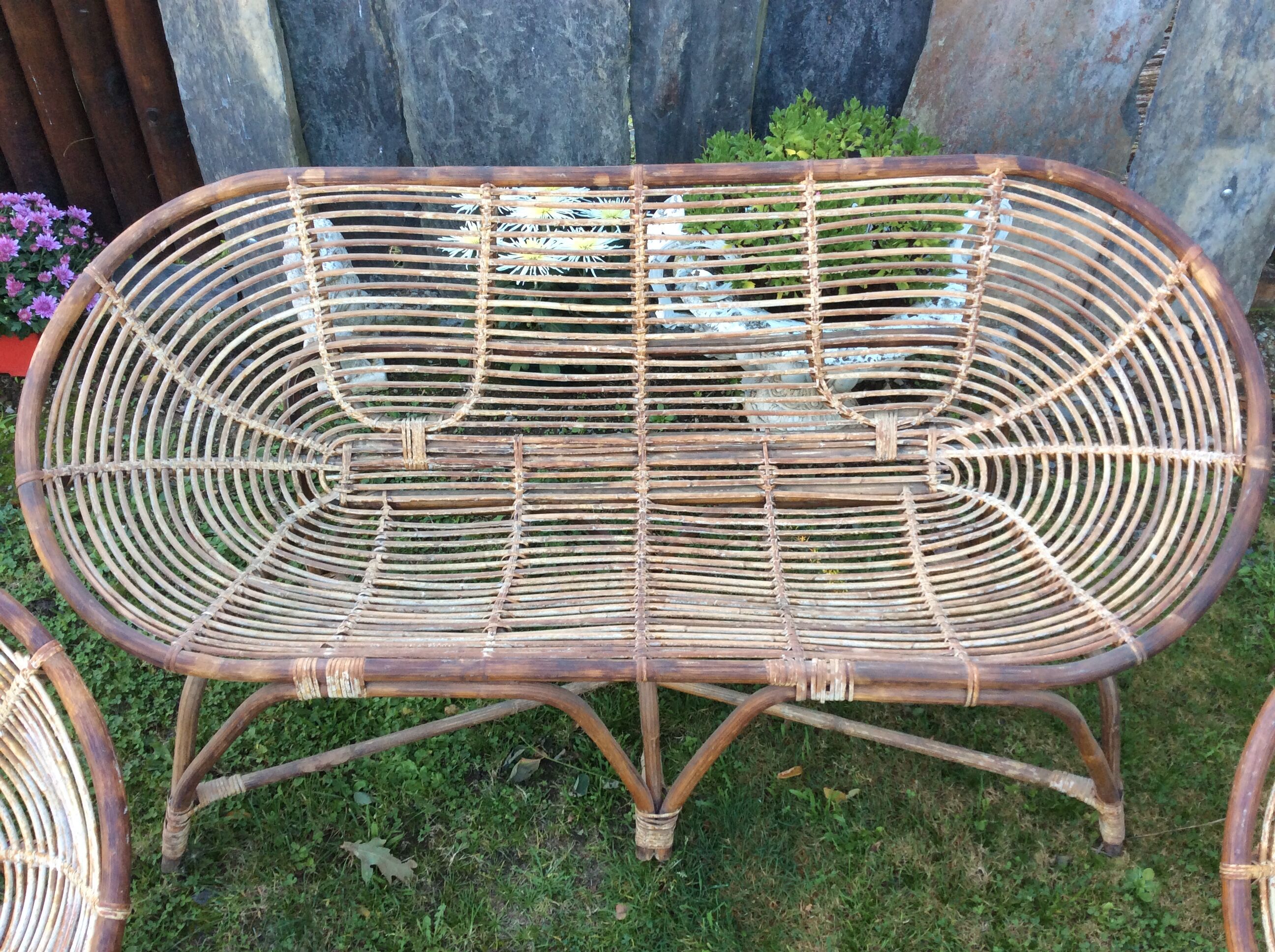 Set of 4 armchairs and 1 vintage rattan bench (5 pieces) inseparable.