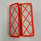 Orange plastic triptych mirror