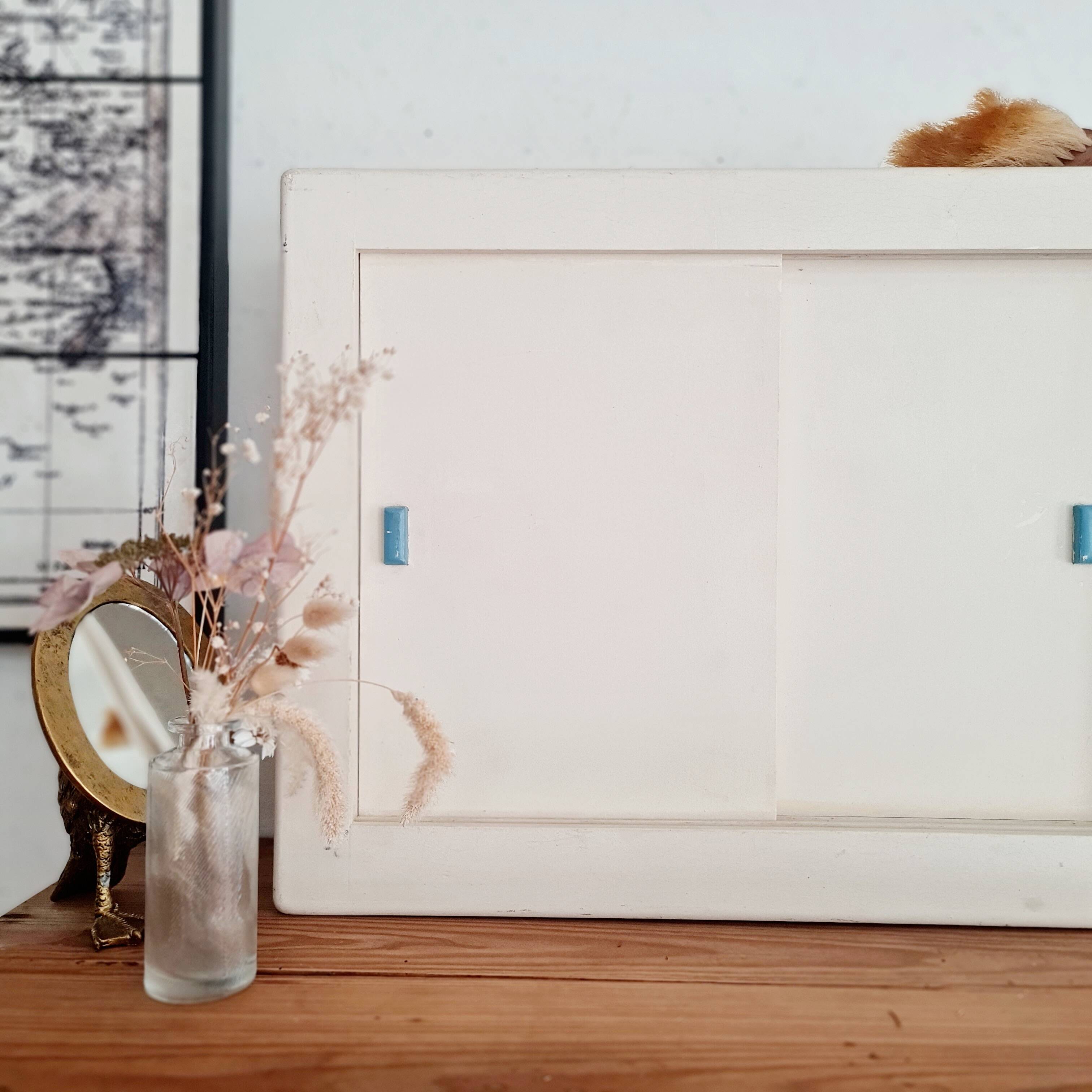 Old white medicine cabinet