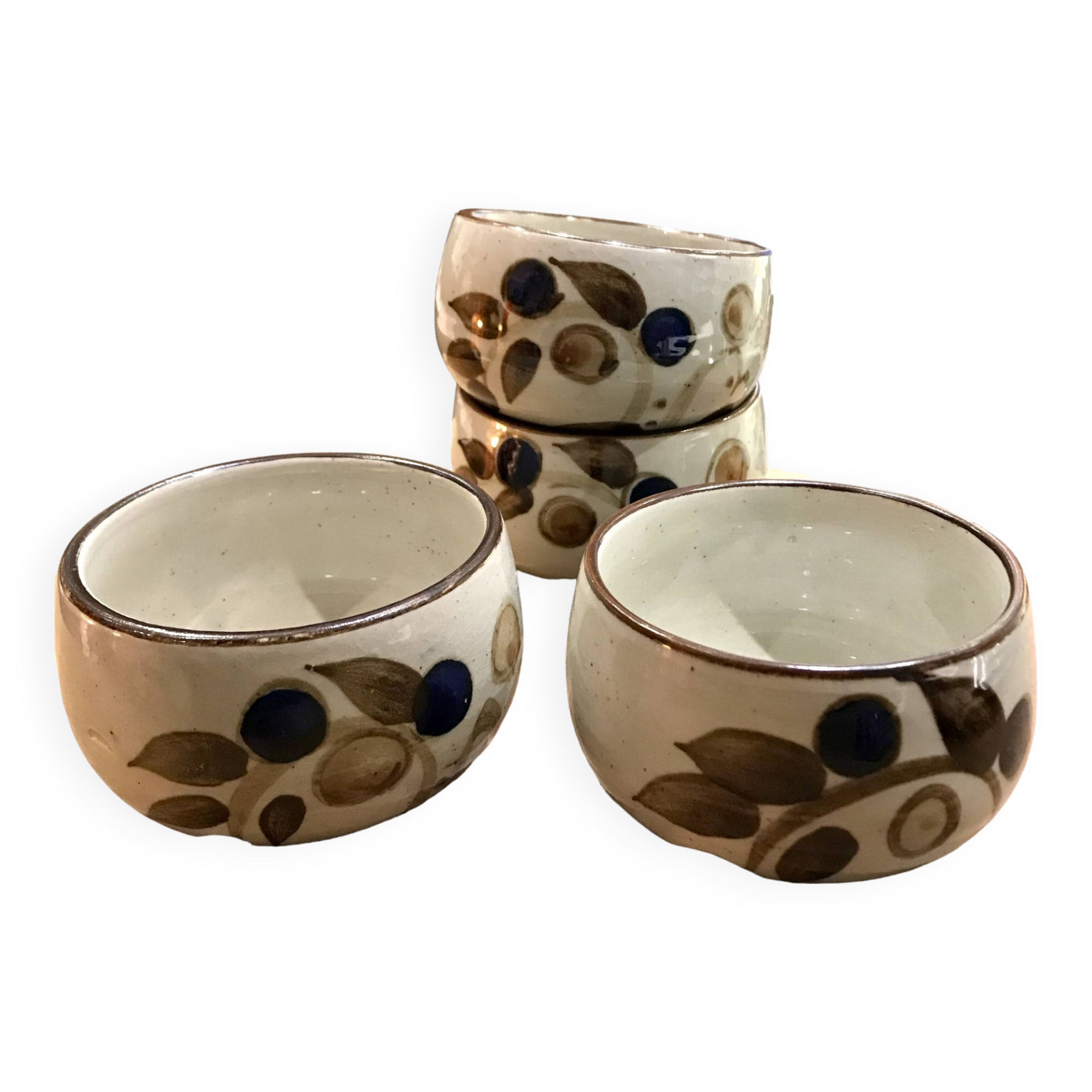Enamelled stoneware tea bowls with plant decor