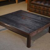 Brutalist coffee table in dark spruce with oak base