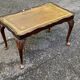 English Chippendale coffee table in solid wood and leather