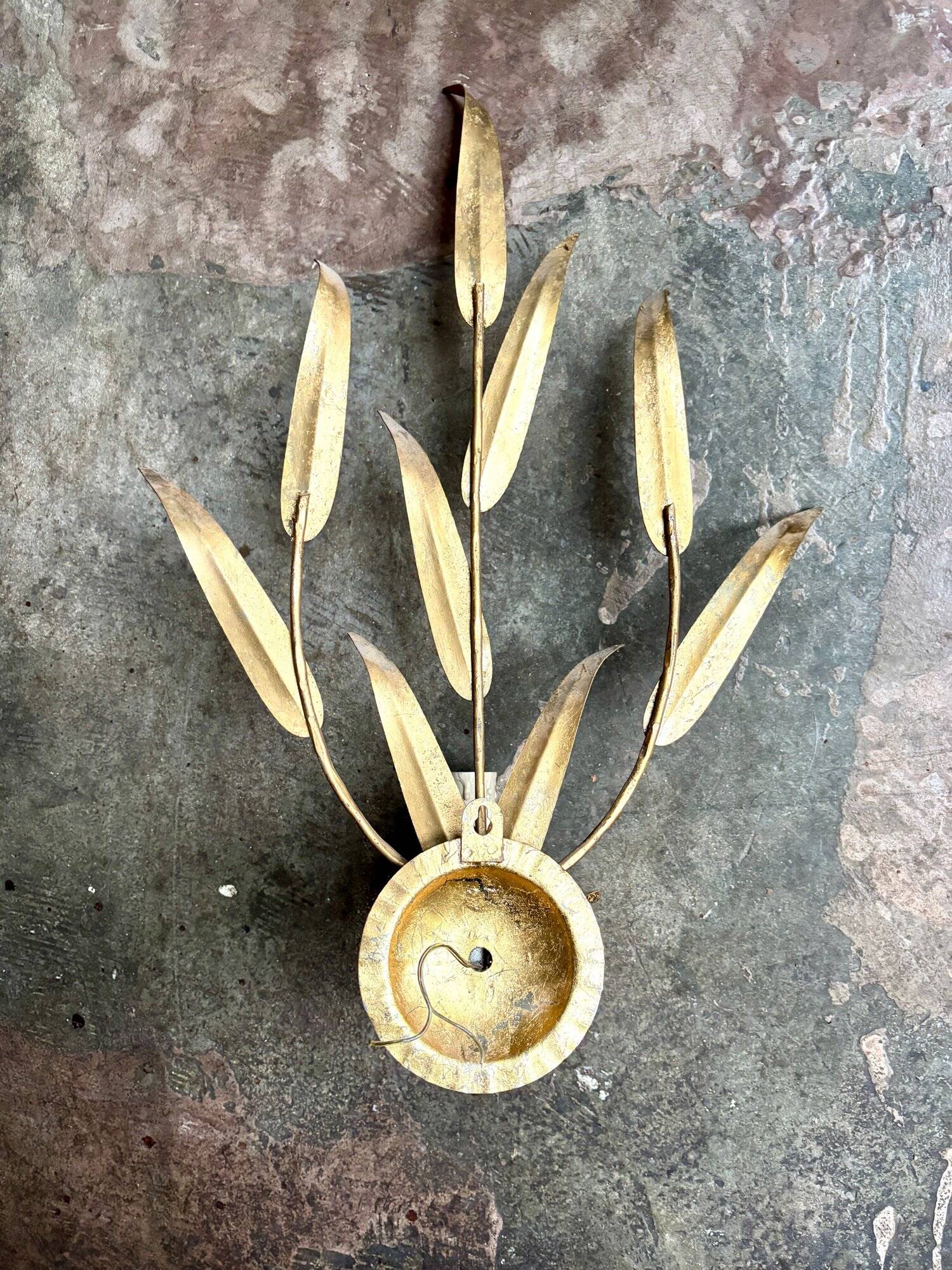 Gold metal leaf wall light