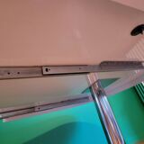 Ligne Roset table in glossy white lacquer, chrome legs, 2 extensions.