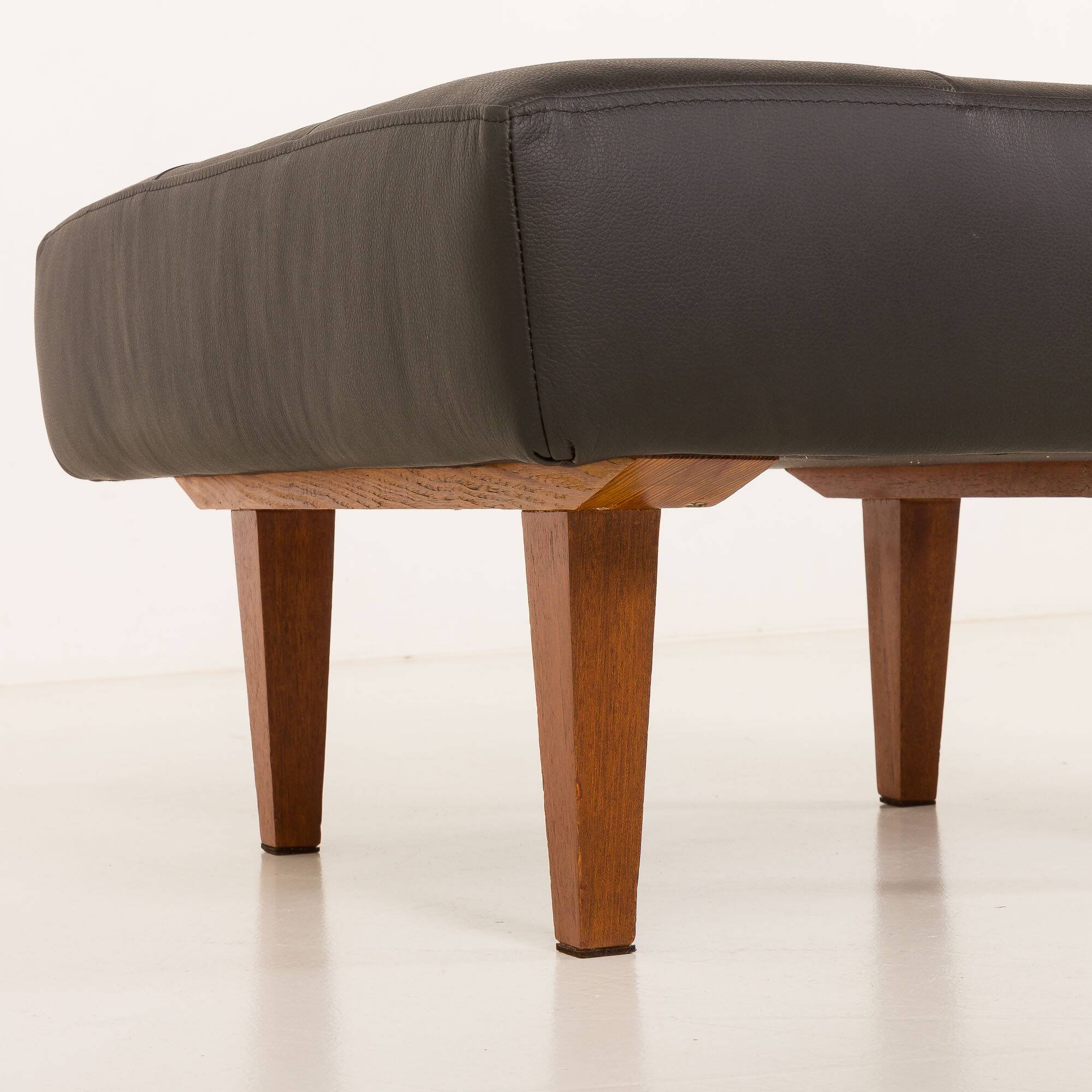 Mid century large ottoman in black leather, 1970s