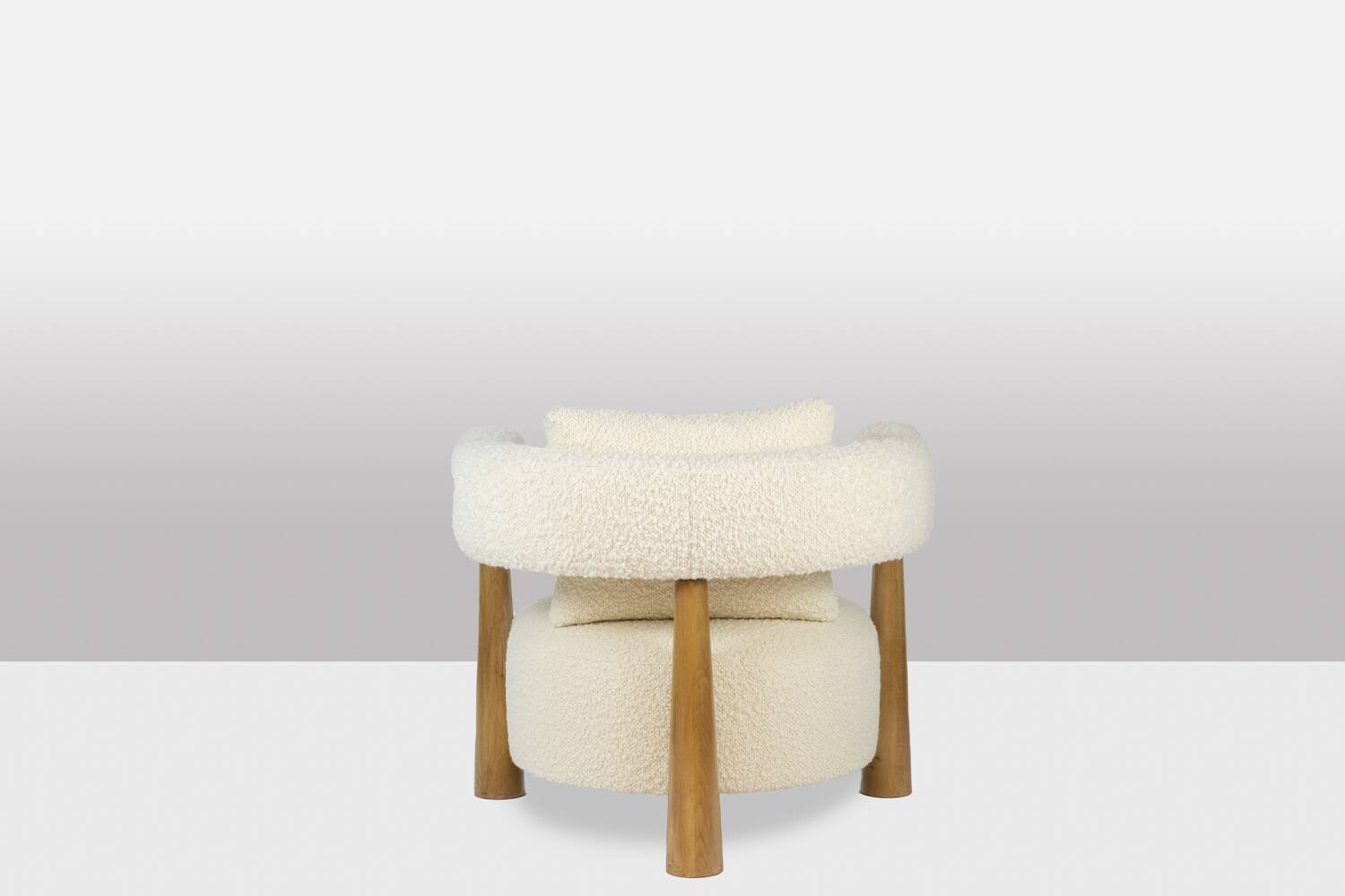Pair of “bean” shaped armchairs, in blond beech. Contemporary work.