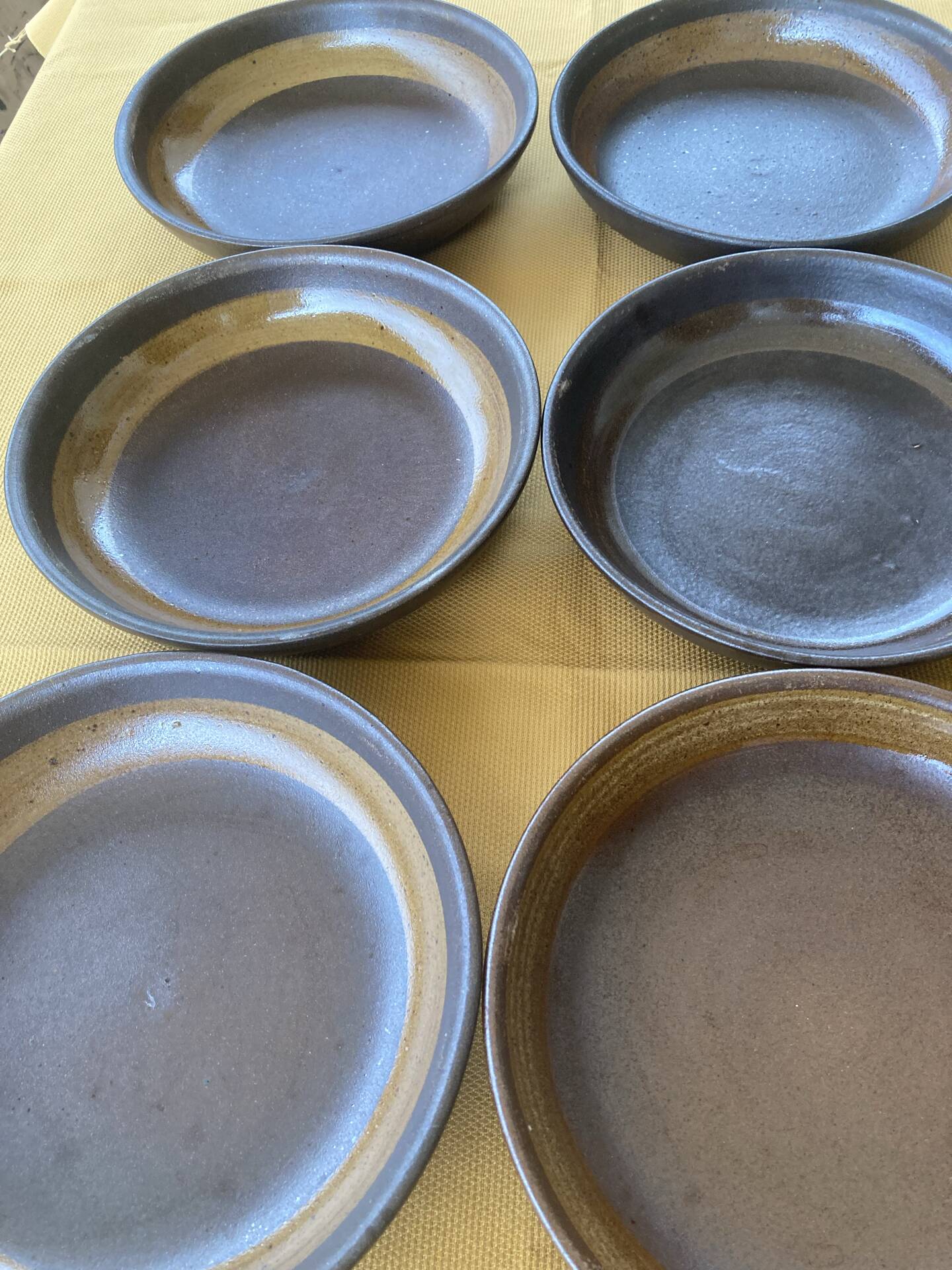 Organic earthenware deep plates from Gré du Marais, France.