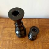 Pair of black turned wood candlesticks