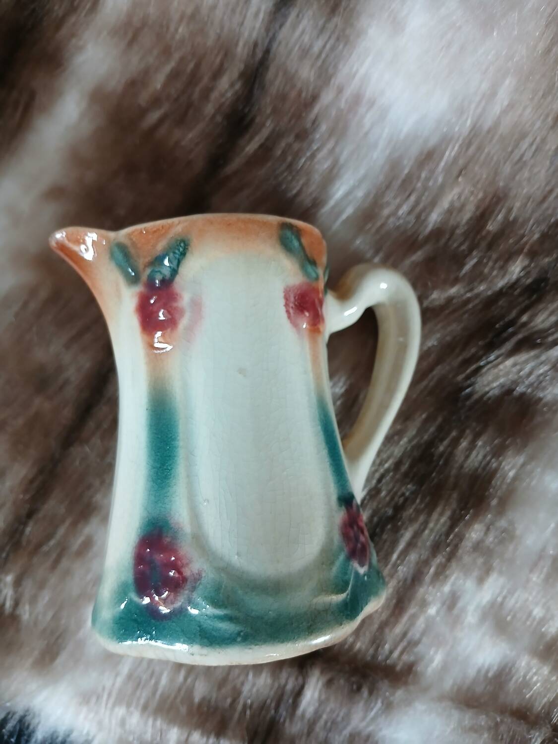 Antique slipware milk jug