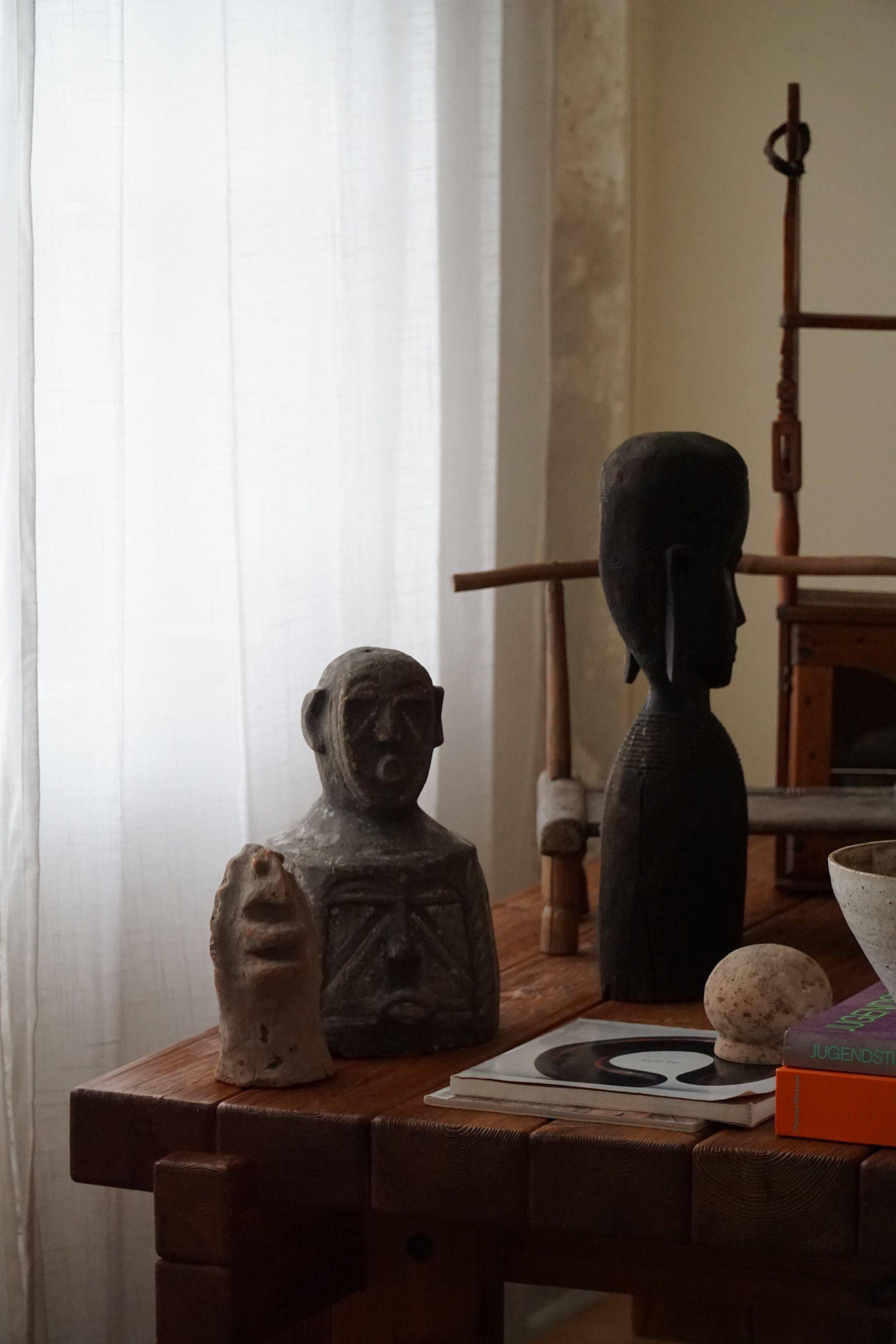 Mid-century decorative African wooden sculpture, made in the 1940s-50s.