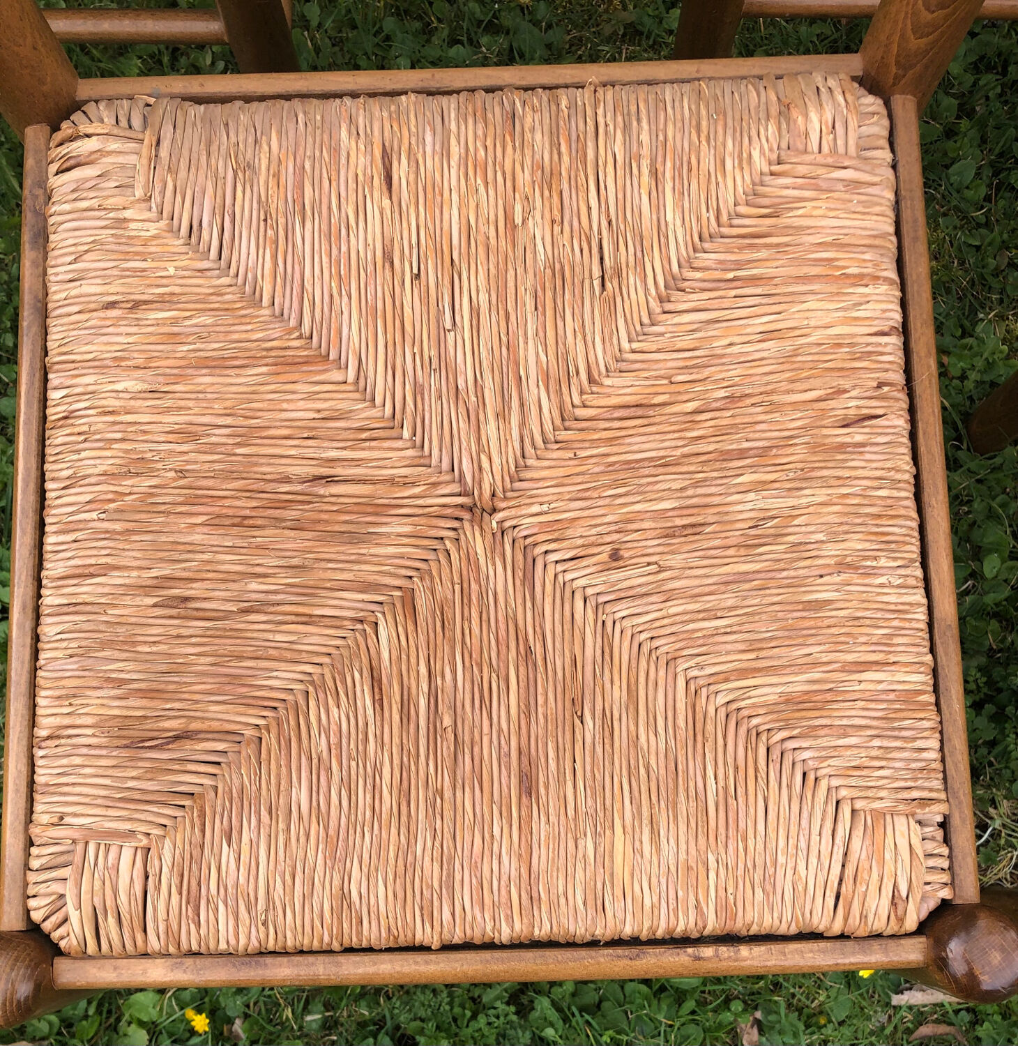 4 wood and straw chairs