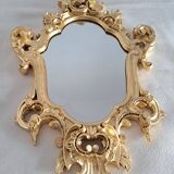 Wooden and gilded mirror with gold leaf